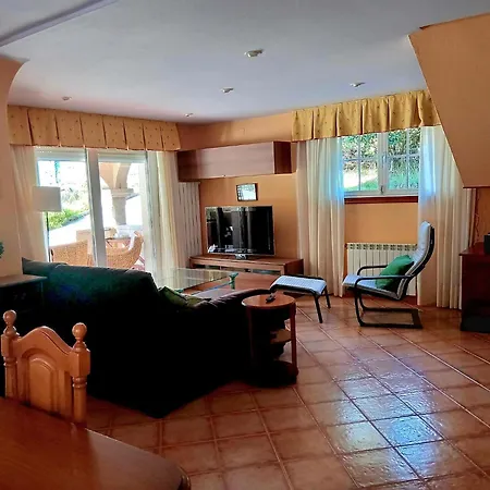 Casa Arneles Playa Casa de Férias